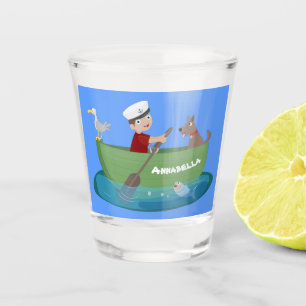 Cute boy sailor and dog rowing boat cartoon shot glass