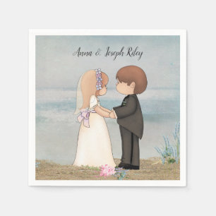 cute bride and groom on sand napkin