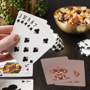 Cute brown puppy playing cards