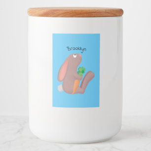 Cute bunny rabbit sitting with carrot cartoon food label