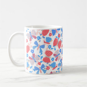 Cute butterfly in a flower garden in red and blue  coffee mug