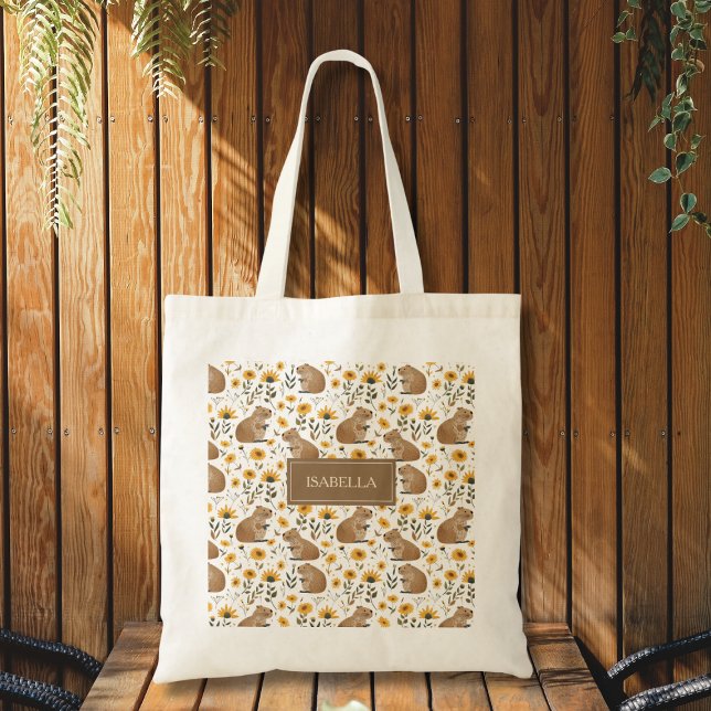 Cute Capybara Floral Tote Bag (cute whimsical capybara sunflower floral tote bag with custom name, fun personalized gift)