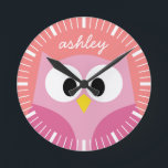 Cute Cartoon Owl in Pink and Coral Round Clock<br><div class="desc">A modern and simple owl with trendy colors. You can add a name,  monogram or other custom text. If you need to move the art around,  click on the customize button to make changes.</div>