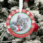 Cute Cat First Christmas Snowflakes Paw Prints Red Ornament<br><div class="desc">This pet cat design features space for a photo and text accented with paw prints and snowflakes on red and green. Perfect for cat lovers! Click the customise button for more flexibility in modifying/adding text and design elements! Variations of this design as well as coordinating products are available in our...</div>