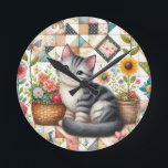 Cute Cat on Floral Quilt Cottagecore Round Clock<br><div class="desc">A delightful gray tabby kitten sits sweetly among blooming flowers in this cozy, cottagecore-inspired design. The backdrop features a vibrant patchwork quilt filled with charming geometric patterns, soft pastels, and vintage textures that evoke feelings of warmth and nostalgia. Surrounding the kitten are blooming sunflowers, roses, and daisies, along with cheerful...</div>