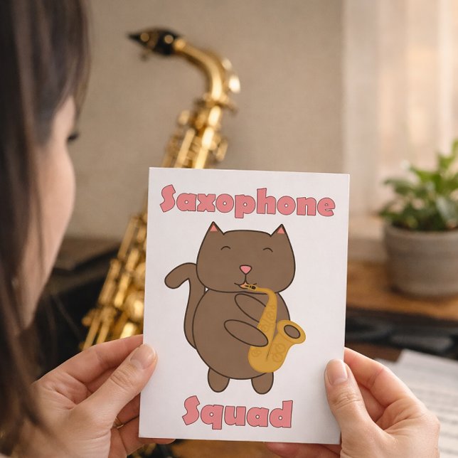 Cute Cat Playing Saxophone “Saxophone Squad” Music Postcard (A postcard with a cat playing the saxophone and the words saxophone squad.)