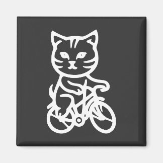 Cute cat riding a bicycle magnet
