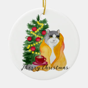 Cute cat under a cosy blanket with a cup of tea ceramic ornament