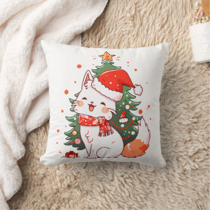 Cute cat wearing Santa hat near Christmas tree Cushion