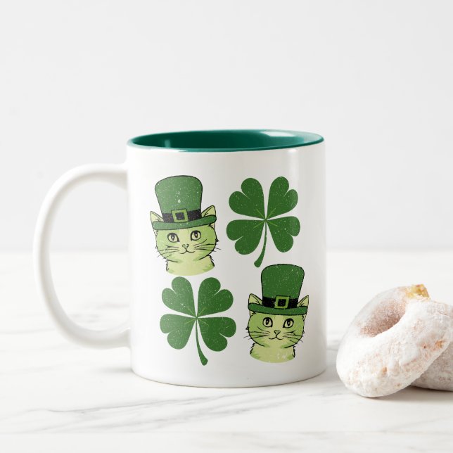 Cute cat with four leaf clover St. Patrick's Day Two-Tone Coffee Mug (With Donut)