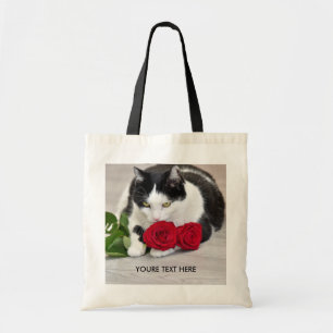 Cute cat with the red rose tote bag