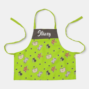 Cute cats on green apron