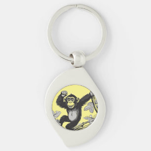 Cute chimpanzee on the branch greets key ring
