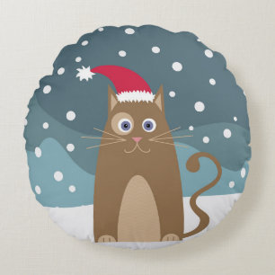 Cute christmas cat in snowy winter night round cushion
