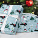 Cute Christmas Scottie Dog Snowman Blue Editable Wrapping Paper<br><div class="desc">Add a little whimsical charm to the holiday season with this cute Christmas gift wrap! An editable template, personalised with your family or the recipient's name. This seamless pattern features original artwork of a Scottie dog wearing a red bow, as he dashes along in the snow! There's a happy snowman...</div>