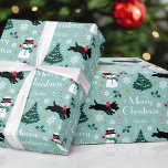 Cute Christmas Scottie Dog Snowman Teal Editable Wrapping Paper<br><div class="desc">Add a little whimsical charm to the holiday season with this cute Christmas gift wrap! An editable template, personalised with your family or the recipient's name. This seamless pattern features original artwork of a Scottie dog wearing a red bow, as he dashes along in the snow! There's a happy snowman...</div>