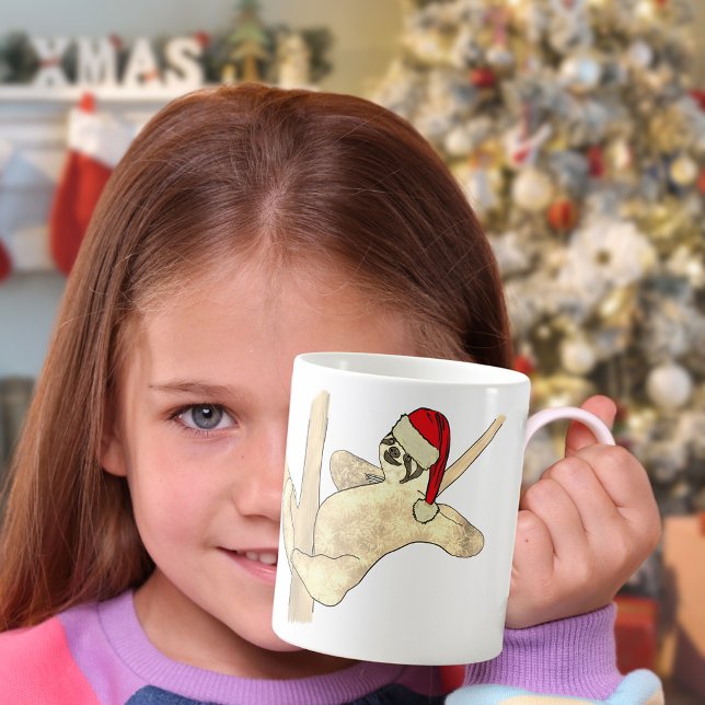 Cute Christmas Sloth in a Tree Coffee Mug (Cute Christmas sloth wearing a Santa hat illustration )