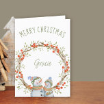 Cute Christmas Snowmen Winter Berry Wreath Holiday Card<br><div class="desc">Personalised Christmas Card with winter berry wreath and cute snowman. The template is set up for you to add a name to the front of the card and you can also edit the message inside. The wording on the front simply reads "Merry Christmas [name]" and the design is decorated with...</div>