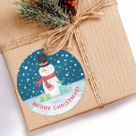 Cute Christmas Winter Snowman Classic Round Sticker<br><div class="desc">A cute snowman with a red scarf and black top hat decorates this Christmas sticker. The words Merry Christmas underneath can be personalised to the text of your choice.A fun accent to your Christmas gift wrapping. Designed for you by Blackberry Boulevard.</div>