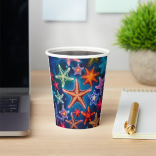 Cute colourful little starfish in sea paper cups