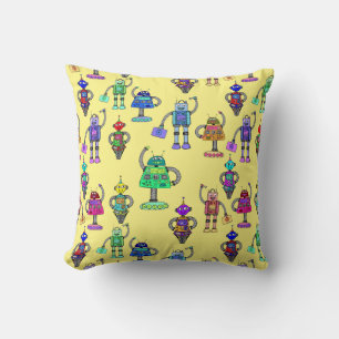 Cute colourful robots on yellow background cushion