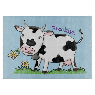 Cute cow in green field cartoon illustration cutting board