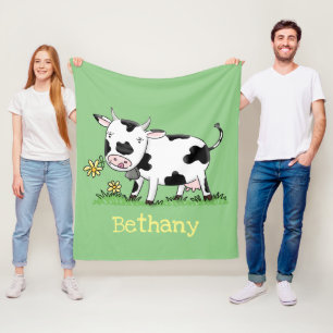 Cute cow in green field cartoon illustration fleece blanket