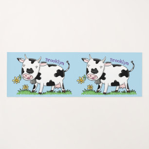 Cute cow in green field cartoon illustration yoga mat