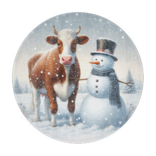 Cute cow & snowman in the winter field cutting board