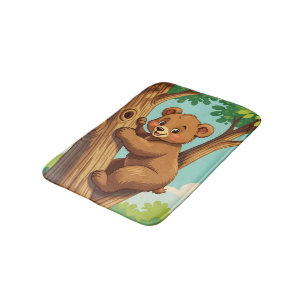 Cute cub bear climbing a tree bath mat