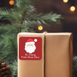 Cute Custom From Santa Claus Red Christmas Gift Square Sticker<br><div class="desc">Customise these cute Santa Claus gift labels with your own personalised text with your kids name in white script. Santa's red hat and white beard are the perfect holiday drawing on this festive red square gift sticker for your presents.</div>