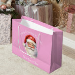 Cute Custom Pink From Santa Claus Kids Christmas Large Gift Bag<br><div class="desc">Customise this pretty pink from Santa Claus large blue gift bag with your own personalised text with your kids name in white script. This beautiful old fashioned drawing of Santa's red hat and white beard are the perfect holiday stickers for your children's presents under the tree on Christmas day. A...</div>
