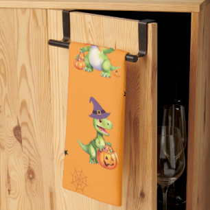 Cute Dinosaur play pumpkin trick o treat halloween Tea Towel