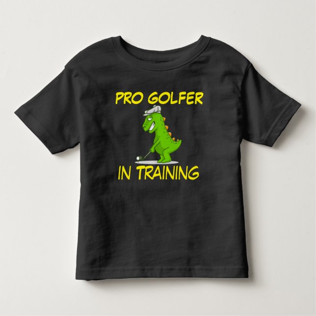 Cute Dinosaur Pro Golfer In Training Toddler T-Shirt (Front)