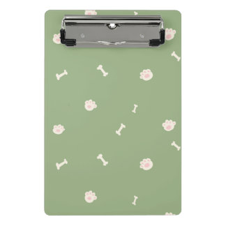 Cute Dog Paw Prints and Bones Pattern on Green Mini Clipboard