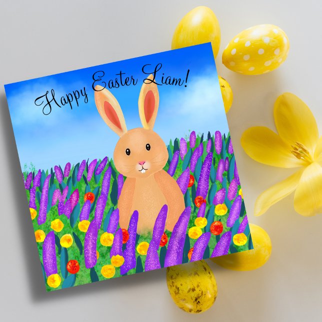 Cute Easter bunny in the flowers Card (A table decorated with Easter eggs, and the Easter card cute Easter bunny in the flowers)