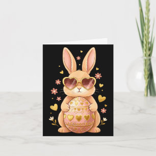 Cute easter bunny with heart sunglasses holding card