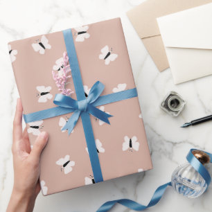 Cute elegant white butterflies on pink wrapping paper