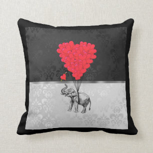 Cute elephant and love heart on grey cushion