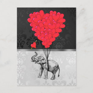 Cute elephant and love heart on grey postcard