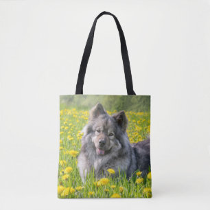 Cute Eurasier Dog in a Meadow Flowering Dandelions Tote Bag