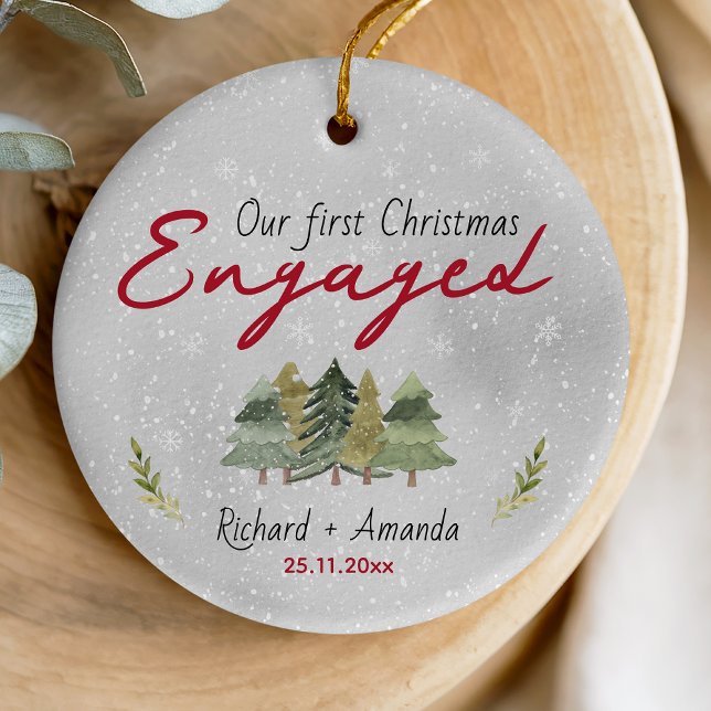 Cute first Christmas engagement green trees Ceramic Ornament (Creator Uploaded)