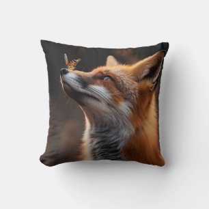 Cute fox with a butterfly sitting on its nose cushion