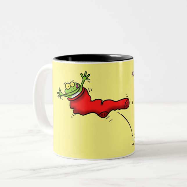 Cute frog in a red sock jumping cartoon Two-Tone coffee mug (Front Left)