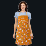 Cute fun snowman Santa Claus Christmas family Apron<br><div class="desc">Cute orange family matching apron featuring a fun pattern with lovely cartoon snowmen with red and scarfs and red and black hats, and adorable little Santa Clauses, decorated with snowflakes, green and red holly leaves, and red and white candy canes. The caption on the upper part, decorated with a stylised...</div>