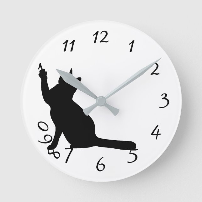 Cute funny black cat playing with numbers clock (Front)