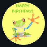 Cute Funny Cartoon Frog Kids Happy Birthday Party Classic Round Sticker<br><div class="desc">Cute Funny Cartoon Frog Kids Happy Birthday Sticker. This colourful green,  blue and orange cartoon frog is waving his big hand to say Happy Birthday.. Customise and change the wording if needed - space will only take a short wording. Just click outside the area to complete the change.</div>