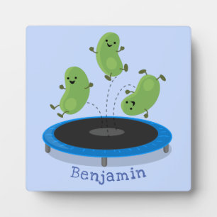 Cute funny green beans on trampoline cartoon plaque
