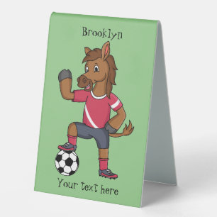Cute funny horse playing soccer cartoon