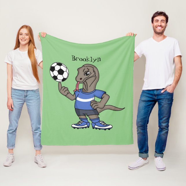 Cute funny Komodo dragon playing soccer cartoon Fleece Blanket (In Situ)